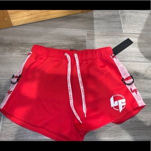 Red LF shorts with side buckle